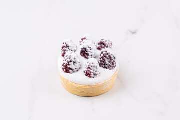 Fruit-berry basket with blackberries and powdered sugar