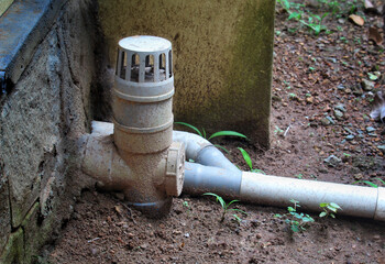 pvc plastic plumbing pipes with joints on the ground in a home