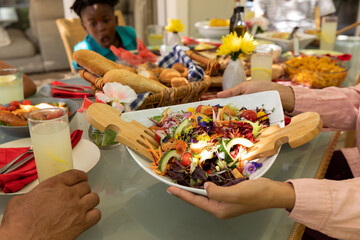 Family eating together at table