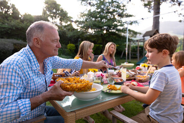 Caucasian family at home in their garden