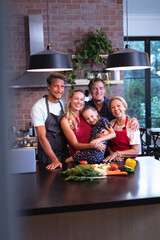 Multi-generation Caucasian family spending time together in the kitchen