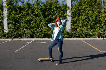 Caucasian woman wearing a protective mask and staking in the streets