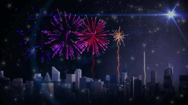 Digitally generated video of fireworks exploding over cityscape against black background
