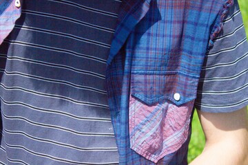 Fragments of fashionable clothing of a young man