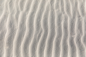 Fototapeta na wymiar wave patterns on white sand, Saracen bay beach, Koh Rong Samloem island, Sihanoukville, Cambodia.