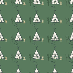 Cute teepee seamless pattern on green background. Native style. Tribal wallpaper.