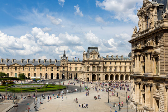 PARIS, FRANCE- JULY 29: The main building of the Louvre Museum on July 29, 2014. The Louvre Museum is one of the largest museums of the world