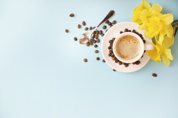 Cup of coffee on blue background