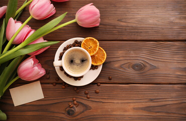 Cup of coffee on wooden table