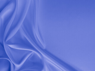 Smooth elegant wavy blue satin silk luxury cloth fabric texture, abstract background design.
