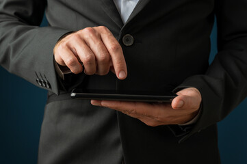 Businessman browsing mobile phone