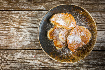 Homemade pancakes on a wooden table.