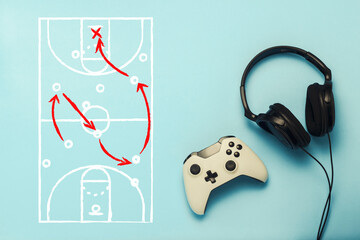 Headphones and gamepad on a blue background. Added drawing with the tactics of the game....