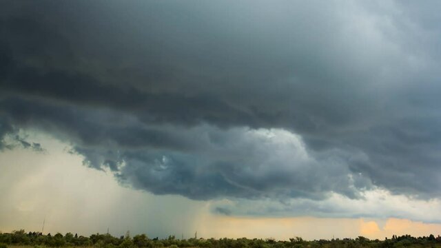 dramatic dark dense stormy clouds time lapse scene