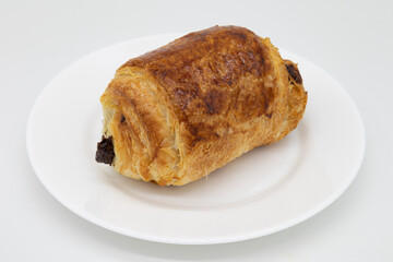 Chocolate Croissant on a White Plate