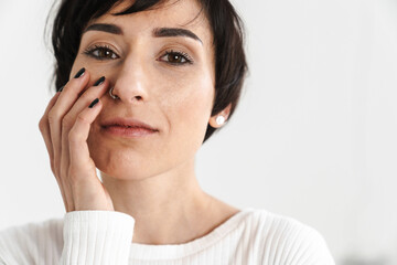 Portrait of an attractive short brunette haired woman