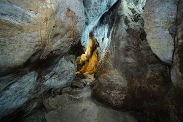 Natural rock cave Light up the path and hallway Wat Tham Khao Pun Kanchanaburi province of Thailand