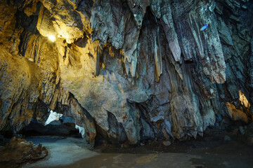Natural rock cave Light up the path and hallway Wat Tham Khao Pun Kanchanaburi province of Thailand