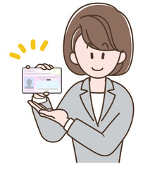 マイナンバーカードの説明をするスーツの女性