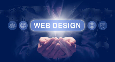Businessmans cupped hands holding an Web Design business concept on a computerised display.