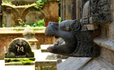 Fototapeta na wymiar Animal, Lion Ancient Temple culture, Ancient pashupatinath temple outdoor decoration,Animal head Decoration