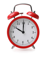 Red alarm clock set at ten isolated over white background
