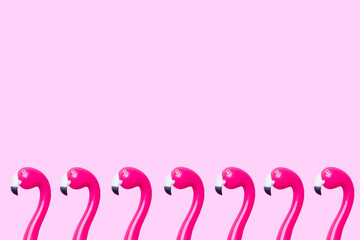 Pink pen Flamingo on a pink background. Copy space Flat lay.