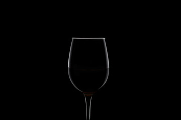wine glass isolated on black background. silhouette