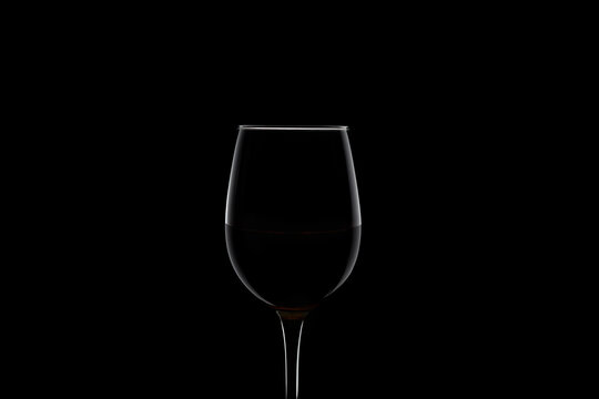 wine glass isolated on black background. silhouette