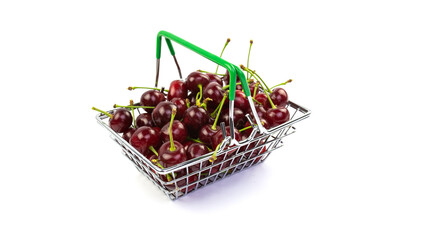 In a metal basket on a white background there are berries