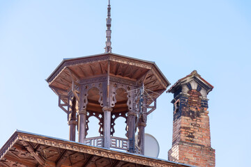 wooden turret on the roof of the building © Searuss