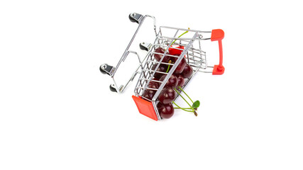 Cherry in a trolley on a white background