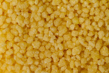 Macro photo of couscous grits. Wheat grits.
