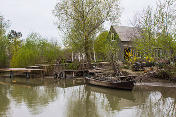 Wooden boat in the Ukrainian city of Vilkovo. The city was built in the Danube Delta. People move...