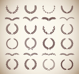 Set of different vintage silhouette laurel foliate, oak and olive wreaths depicting an award, achievement, heraldry, nobility, emblem. Vector illustration.