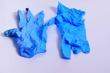 Used doctor gloves on a white background