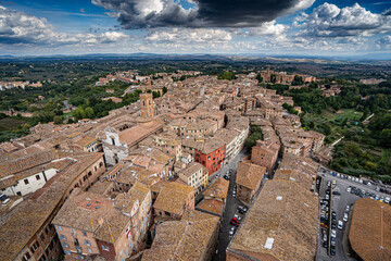 Siena, Italy panorama rooftop city view. Siena Cathedral and Mangia Tower