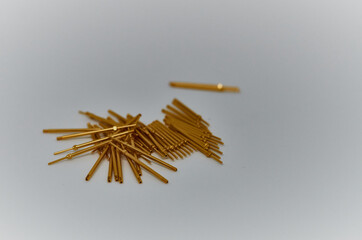 Potentiometers stand on the gray background. Many Potentiometers. Macro close up of electronic...