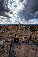 Siena, Italy panorama rooftop city view. Siena Cathedral and Mangia Tower