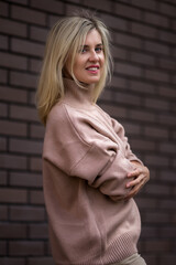 Woman portrait. Professional headshot of middle aged 40  years old woman outdoors. City street shot.