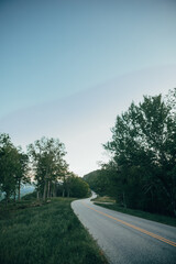 Winding mountain road during the summer