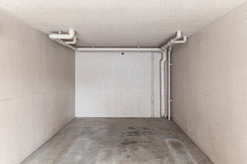 Perspective of Empty white basement concrete room.
