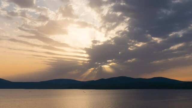 Romantic colorful sunset over the sea. summer travel, holidays, recreation landscape timelapse.
