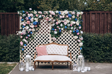 Wedding place of the newlyweds. Ceremony area. Wedding flower arch. Decoration and decor.