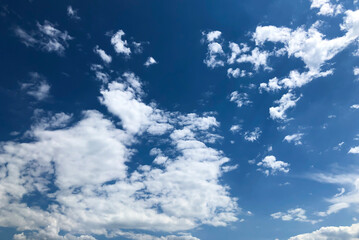 Naklejka na ściany i meble background blue sky clouds sunny day