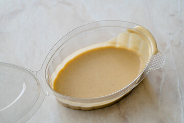 Tahini Hummus Sauce for Falafel Balls in Plastic Cup Ready to Use and Eat.