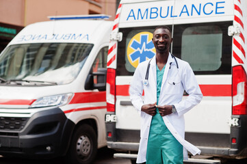 African male paramedic standing in front of ambulance car. © AS Photo Family