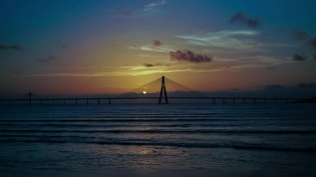 4K Time lapse footage of Sunset at Bandra Worli sea link also known as Rajiv Gandhi Sea link From Window Glass Reflaction Mumbai, India.