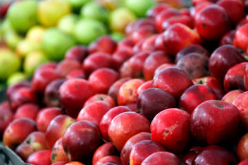 Red apples in the stock with blue apple background