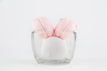 pink, white and beige marshmallows on a plate, isolate